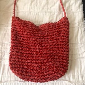 Red woven bucket bag